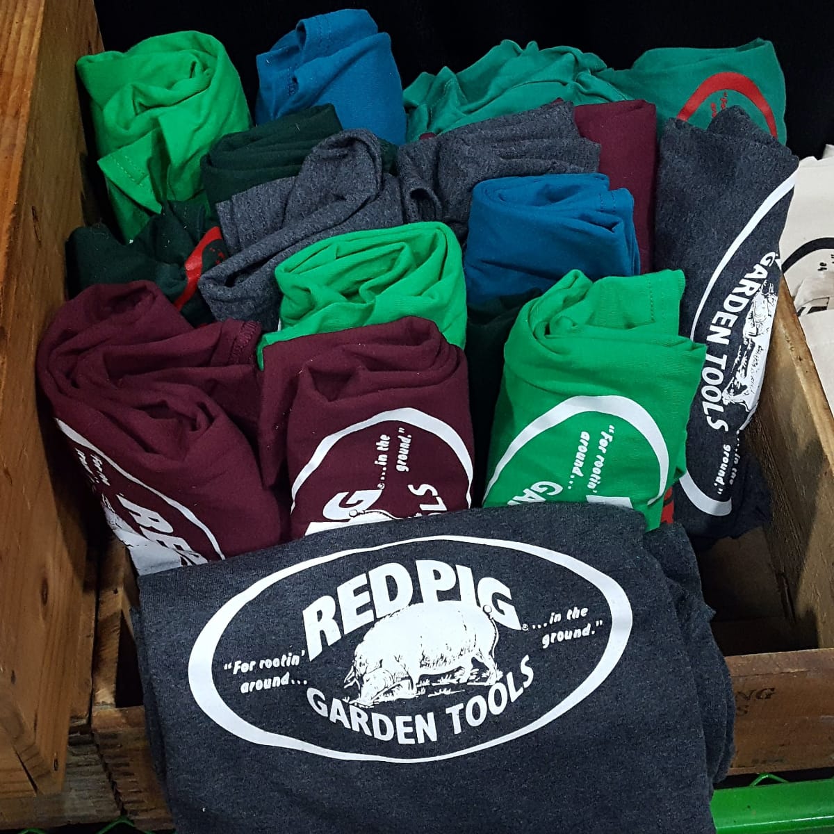 Additional t-shirt colors as seen at garden shows are charcoal grey, kelly green, dark red, and turquoise