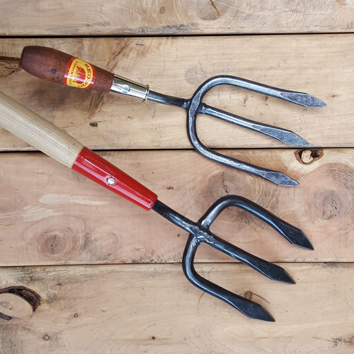 The forged three-tined hand digging fork can also be placed on an 18” handle (for an additional $12) for use in raised bed gardens.
