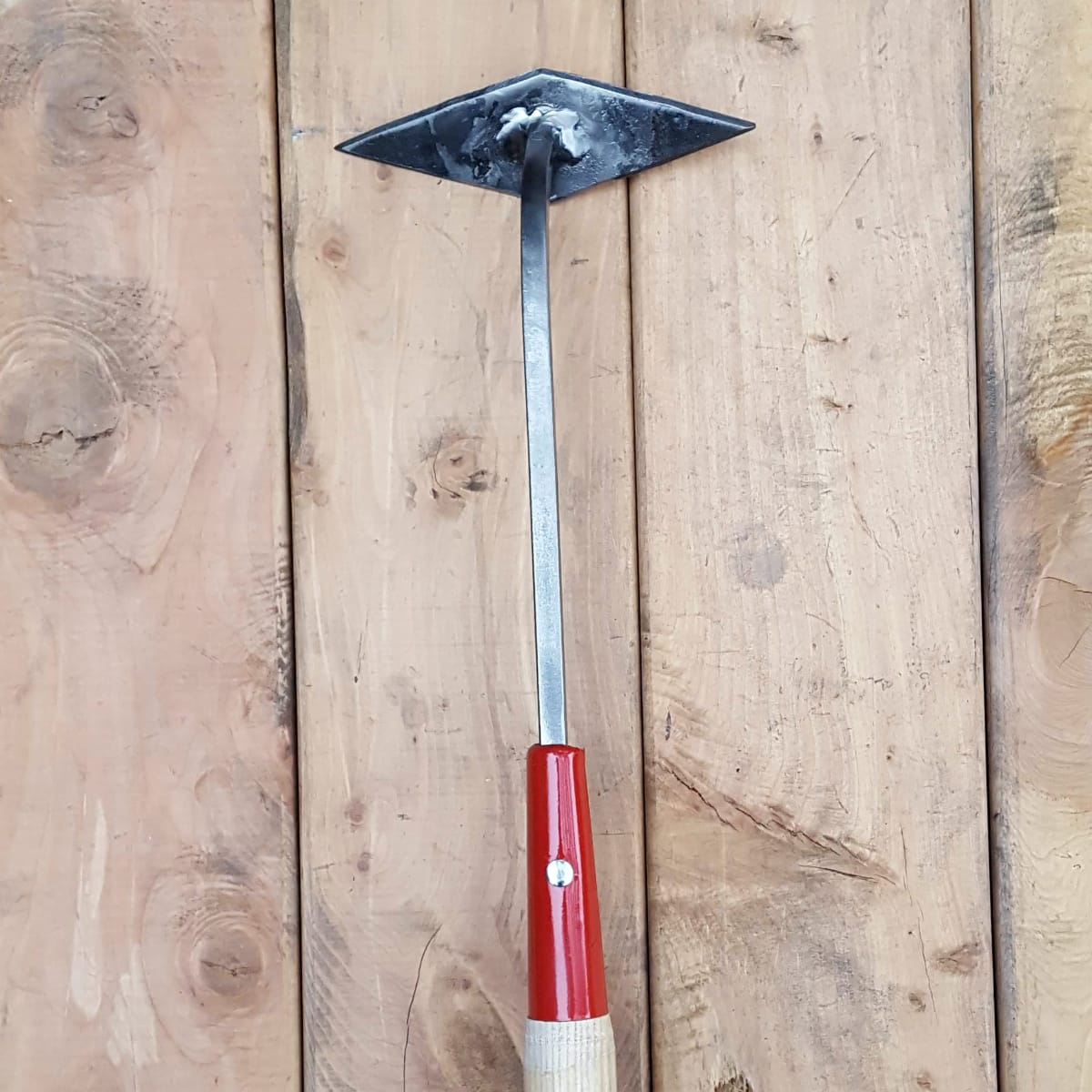 The tang-and-ferrule version is also riveted to the handle. The diamond head is welded to the shank and is sharpened on all sides.