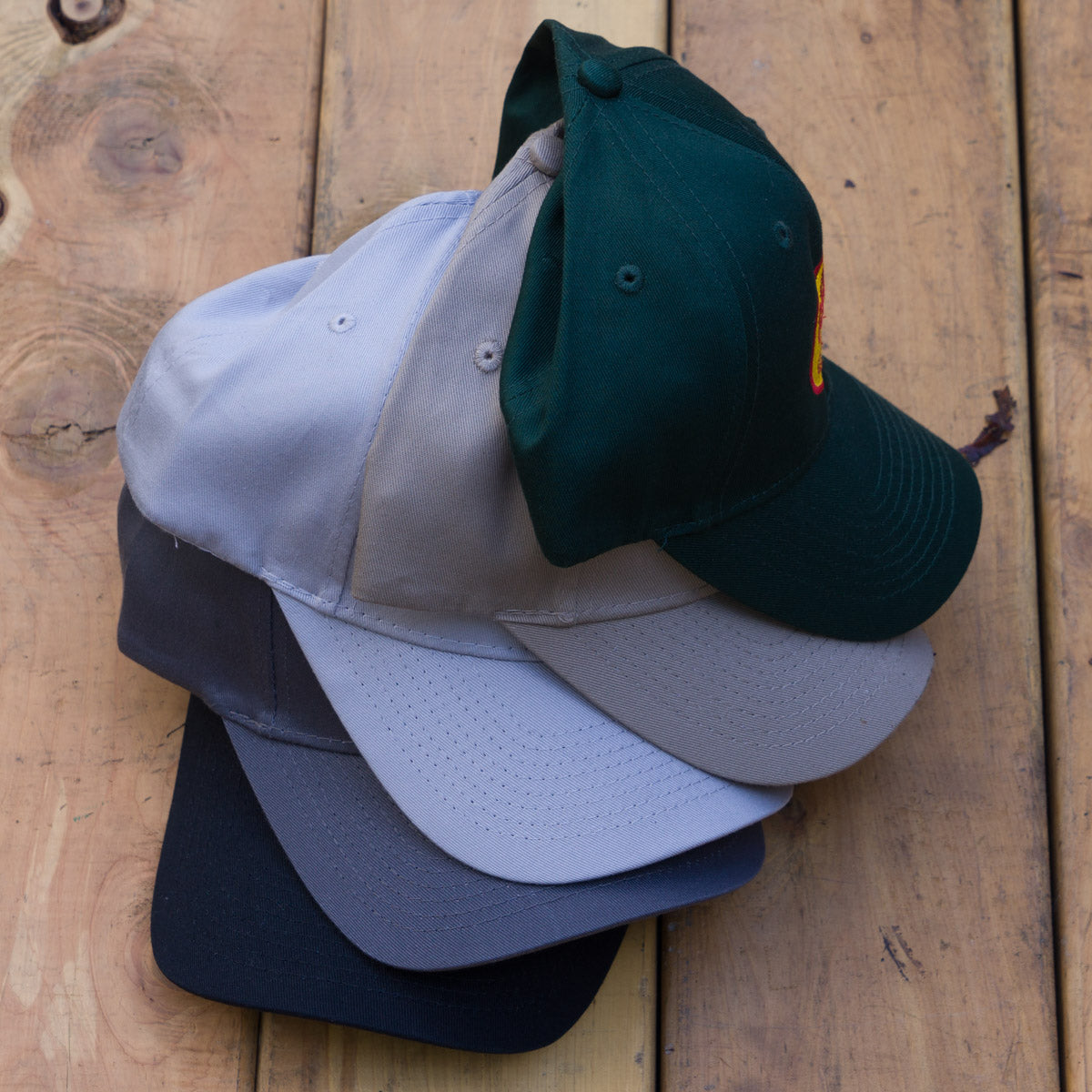 All cotton twill colors: Black, Grey, Light Grey, Khaki, and Hunter Green. These are light weight for summer weather.