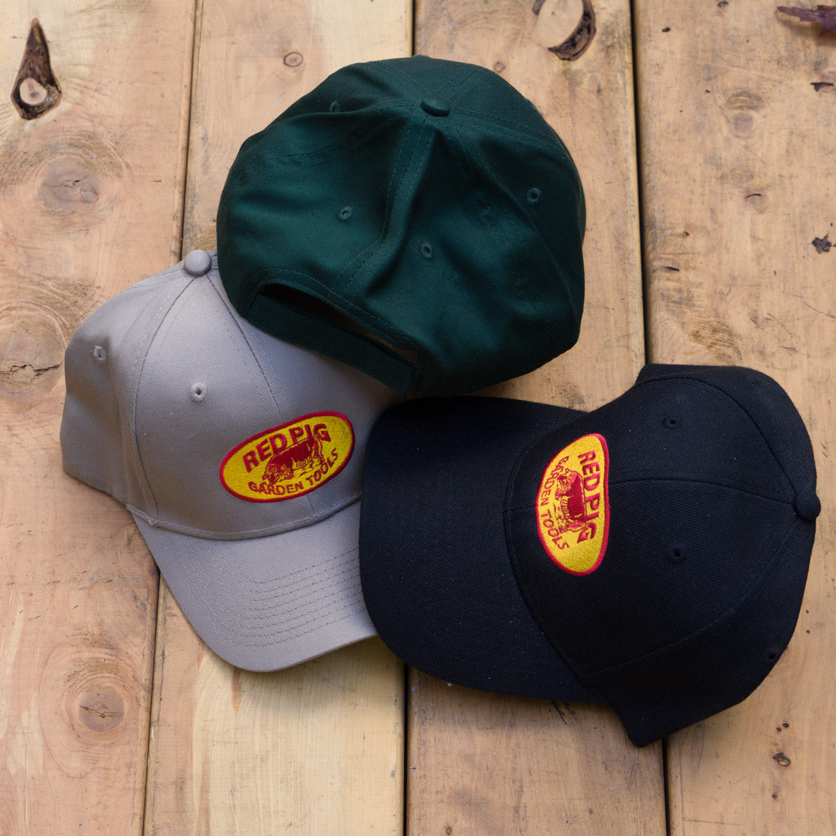 Back and front of the classic logo hats. All hats have the 'hook and loop' closure at the back.