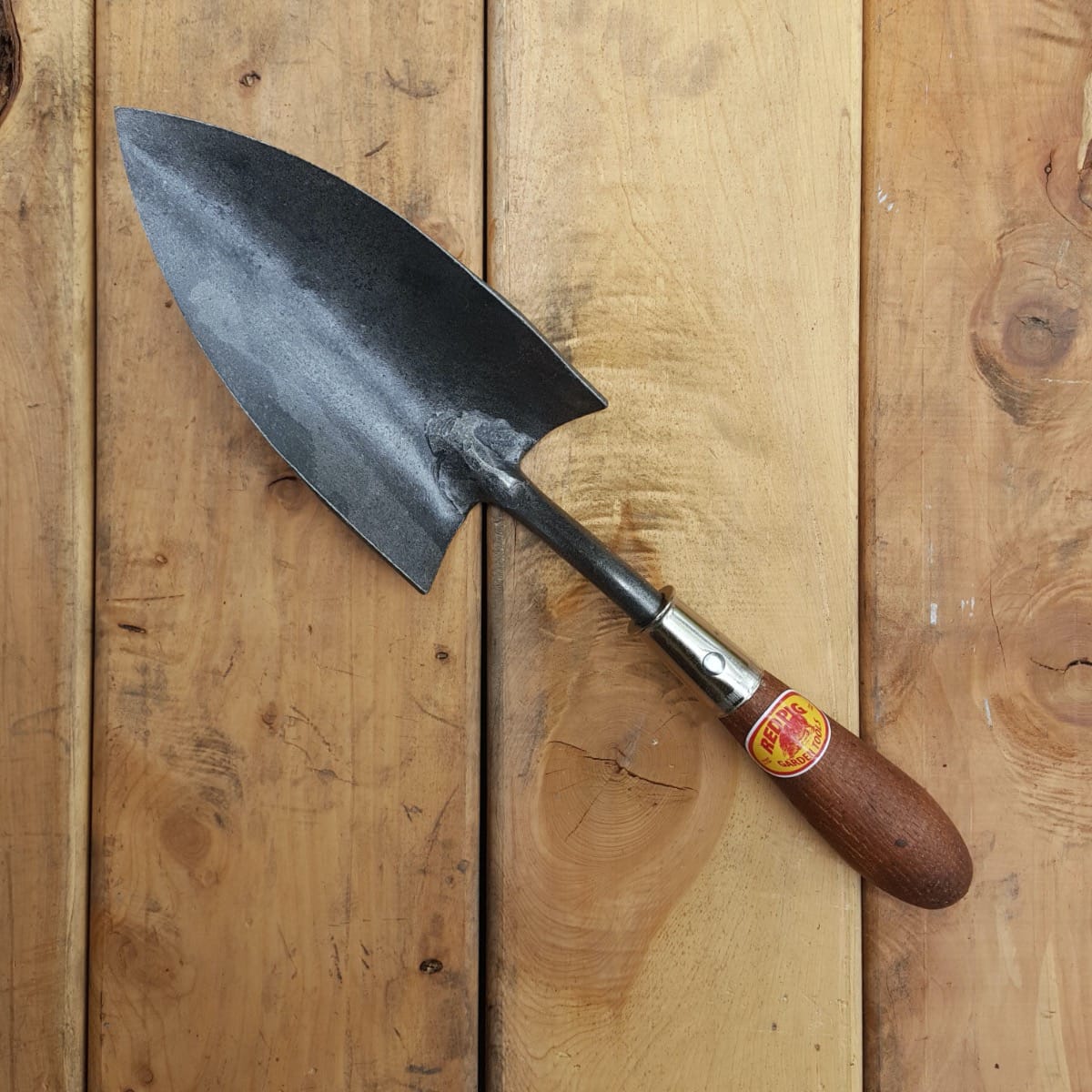 A large, heavy duty trowel great for digging.