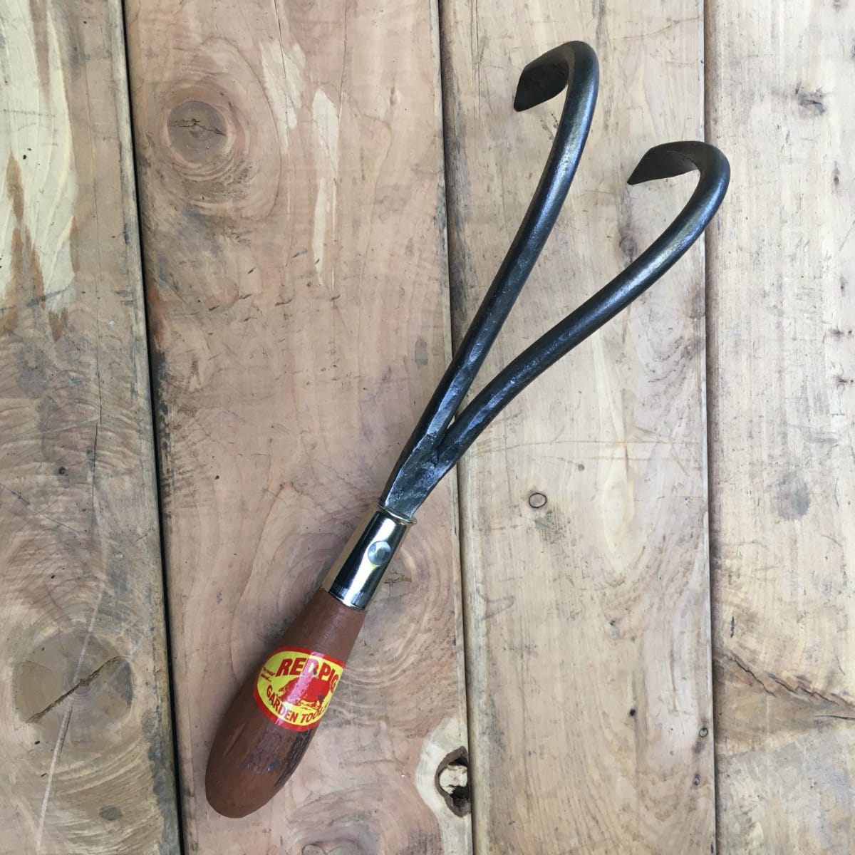 The two-tine cultivator can aerate or agitate the soil on either side of a planted row and is slightly lighter than the 3-tine version providing more versatility for those who want it.
