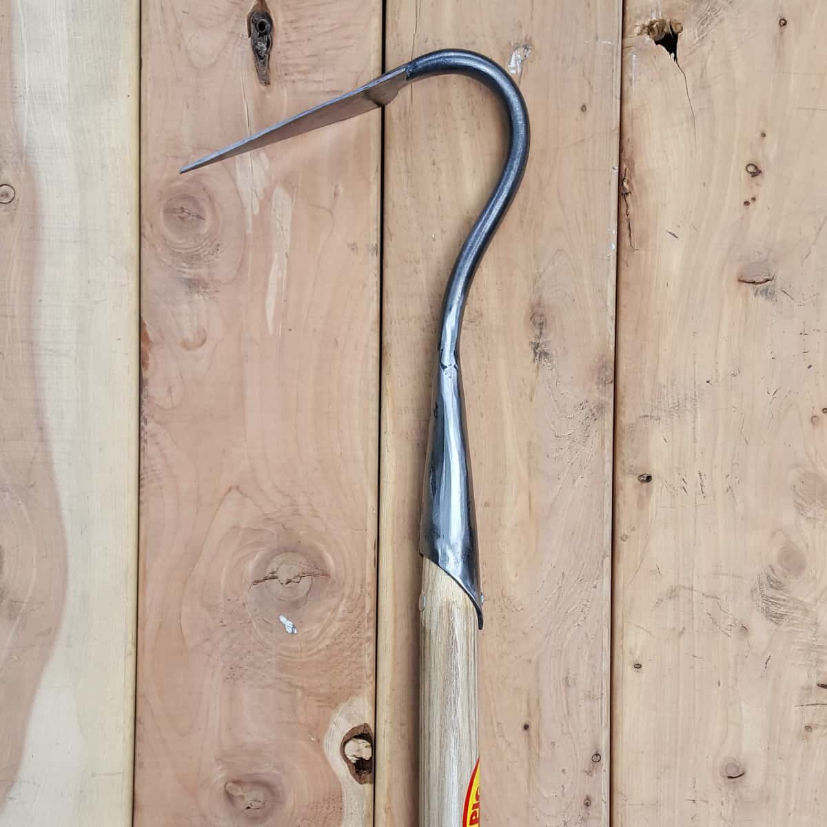 The V Hoe is an aggressive cultivator and weeder and comes standard with a solid socket connection on the long handle.