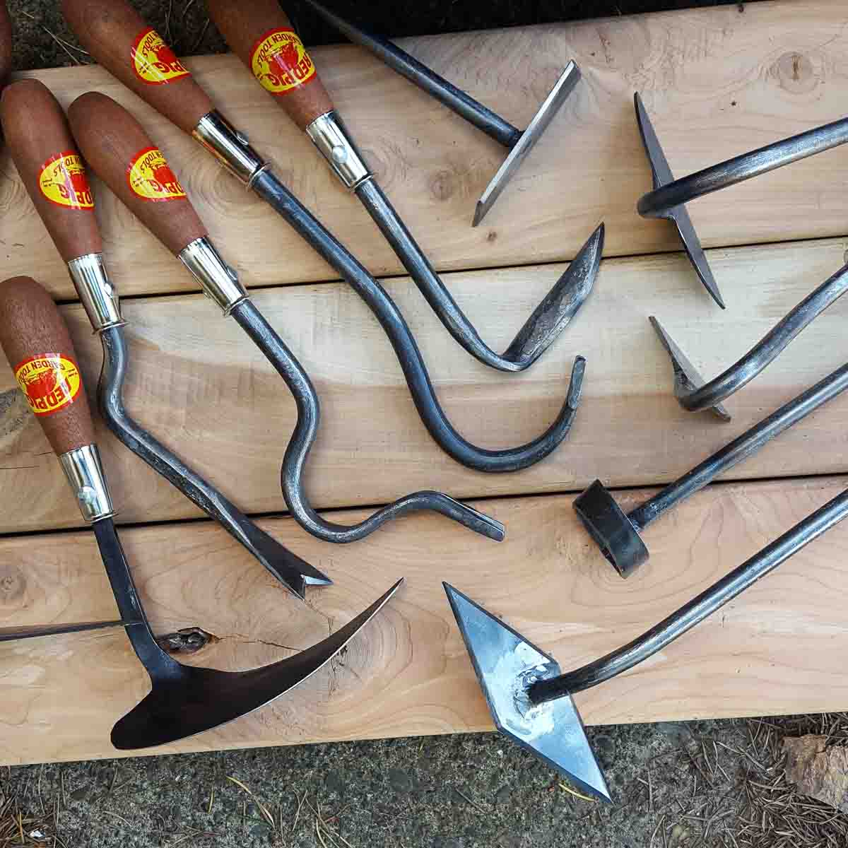 Half moon hoe in the upper right amongst a selection of our other weeding and thinning hoes and tools.