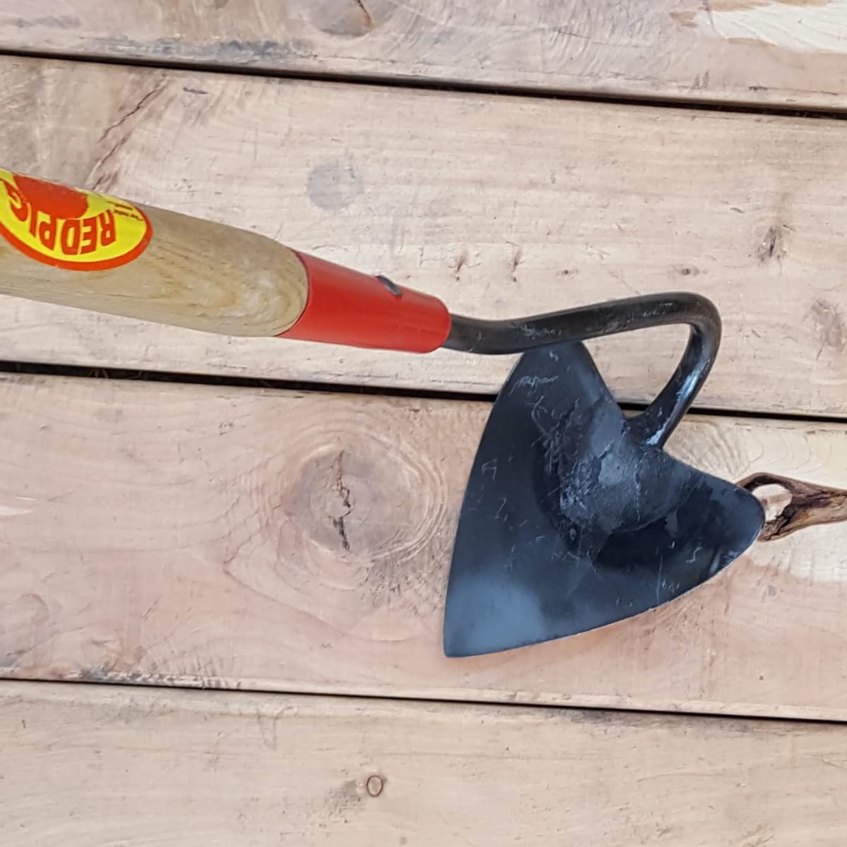 This multi-purpose tool furrows, can be used for hilling, and picking out weeds. Medium 5" wide head with tang-and-ferrule pictured.