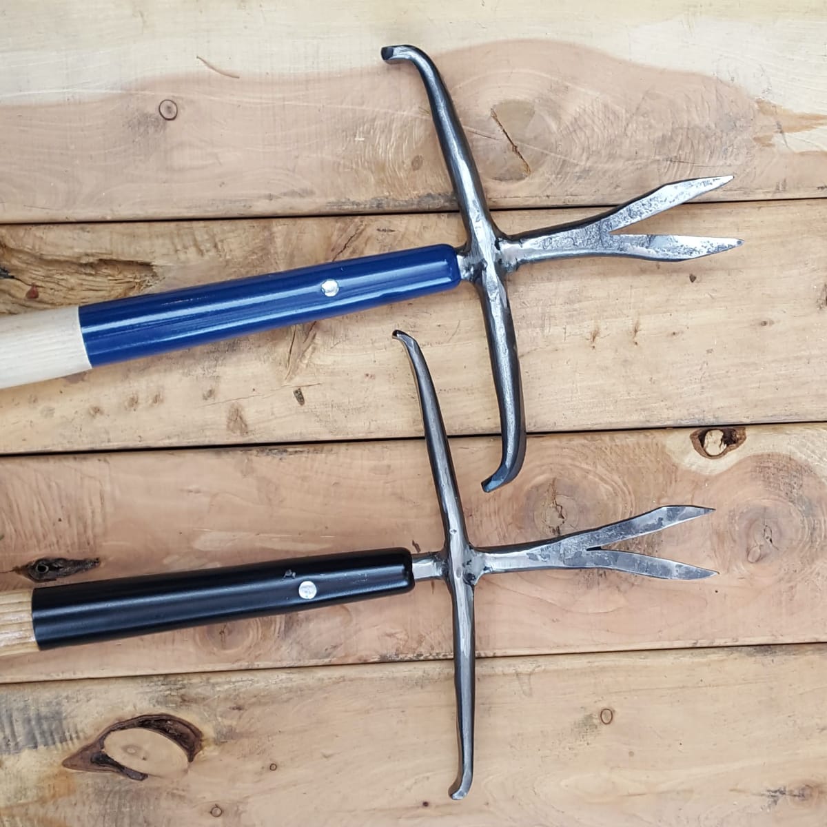 Comes as an acreage version made from 3/4" steel seen here in blue or the home-owner's or yard version made from 1/2" steel.