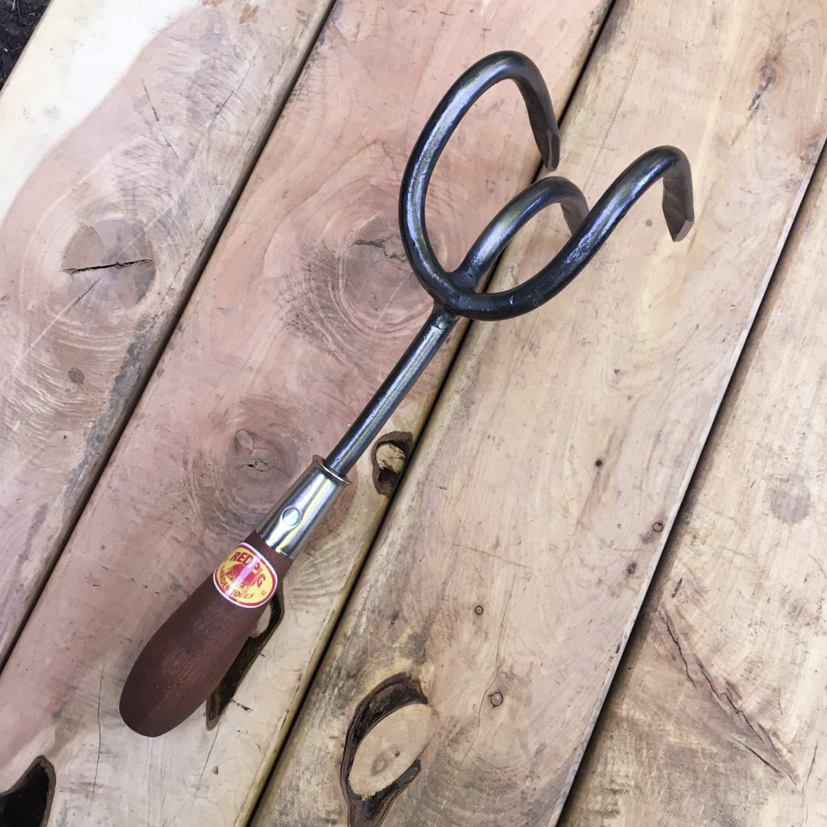 A three-tine cultivator with off-set tines is one of the best way to maintain amended soil in your gardening beds.