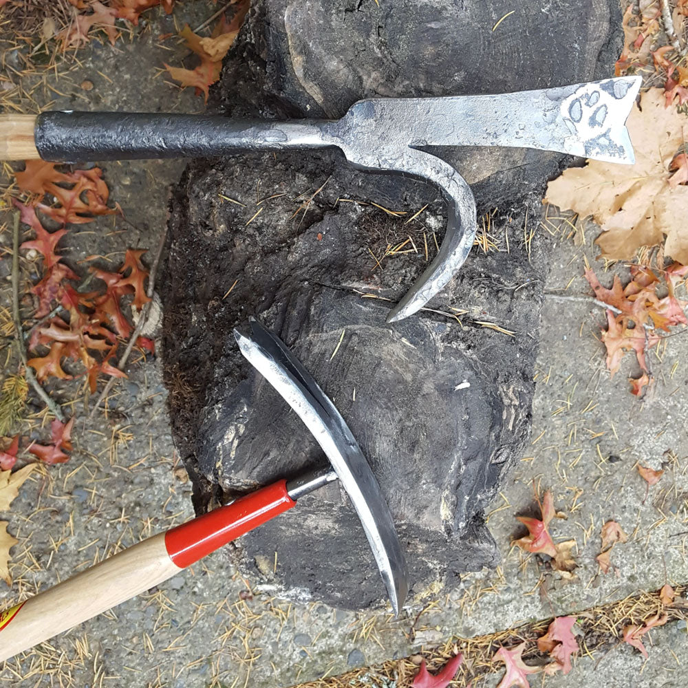 Hand forged berry hook with the abbott weeder on the long handle.