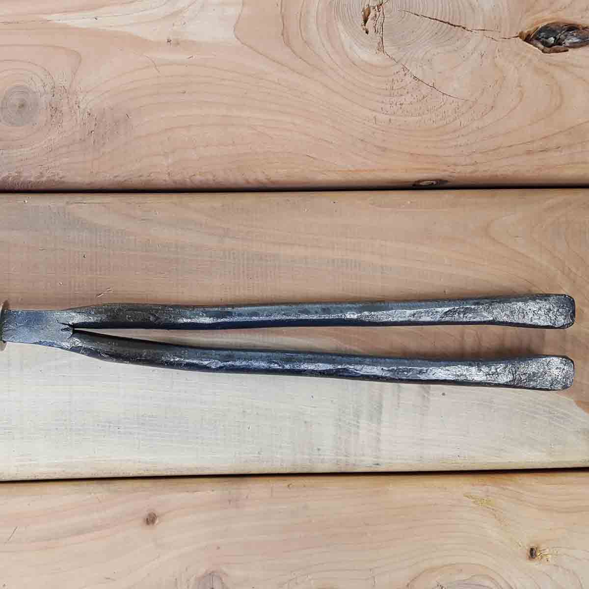 Bulb lifters have two prongs and round tips for getting under bulbs to lift them, without damaging them, for over winter regions.