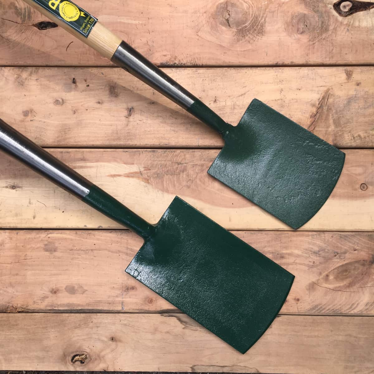 The forged spades from Bulldog come in a variety of sizes. The two smallest don't have treads and are useful for tightly planted areas, borders, and gardeners who prefer smaller sized tools. At top is the 7" shrubbery spade, below the 9" border spade.