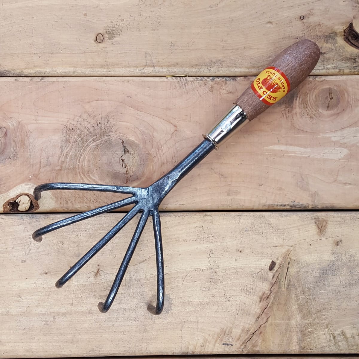 Large crows foot cultivators are a great tool for scratching up dirt, mixing in soil amendments and compost, pulling leaves out from under shrubs, and more.