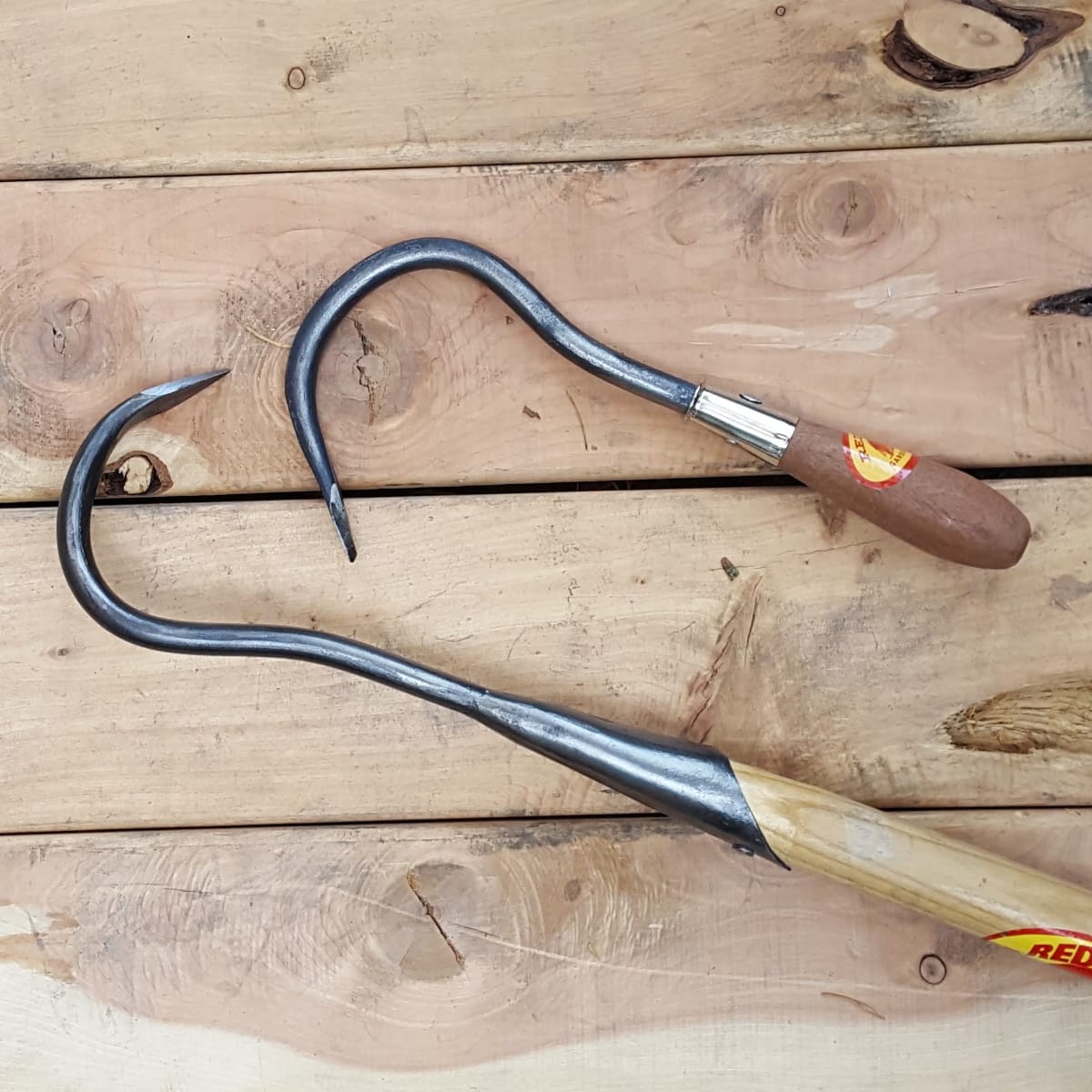 The standard Single Tine Cultivator comes with a hand-forged solid socket connection, seen at left. The actual head size is the same at the hand tool- seen at right.