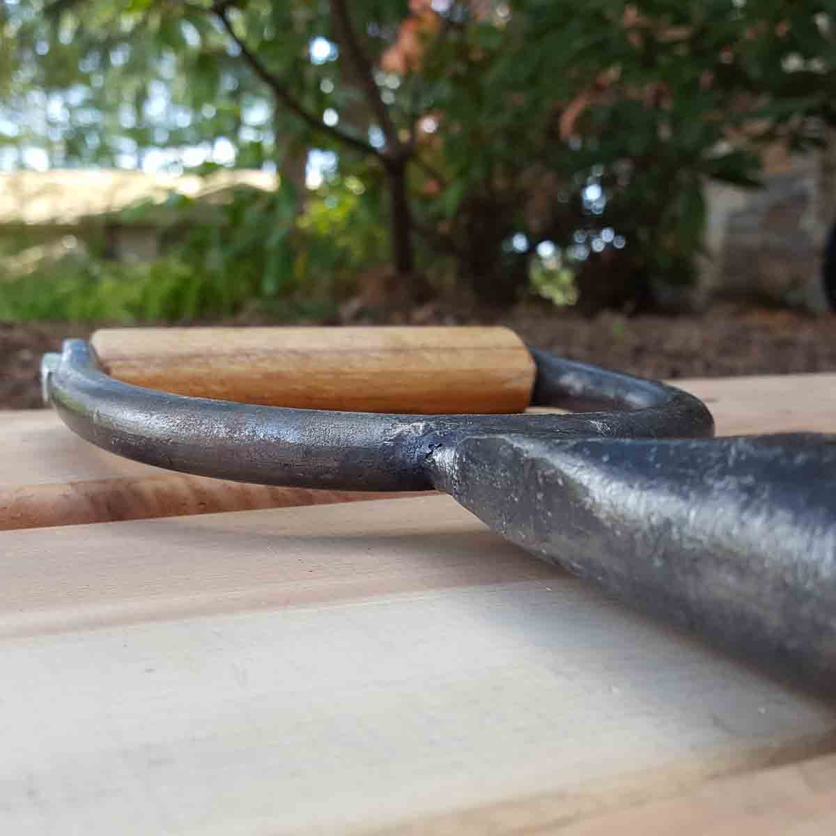 This is a key tool in the English gardener's kit. Less known in American, but very useful when planting lots of small bulbs (garlic, onion) or large seeds.