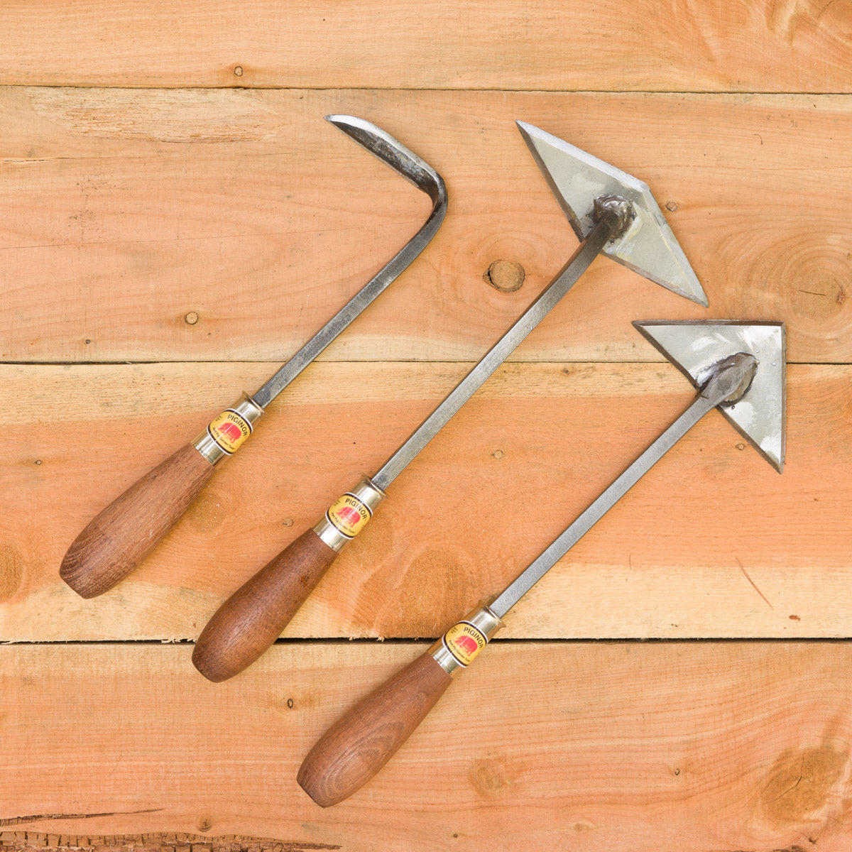Pictured from left to right: Cape Cod Weeder, Diamond Hoe, Arrow Weeder