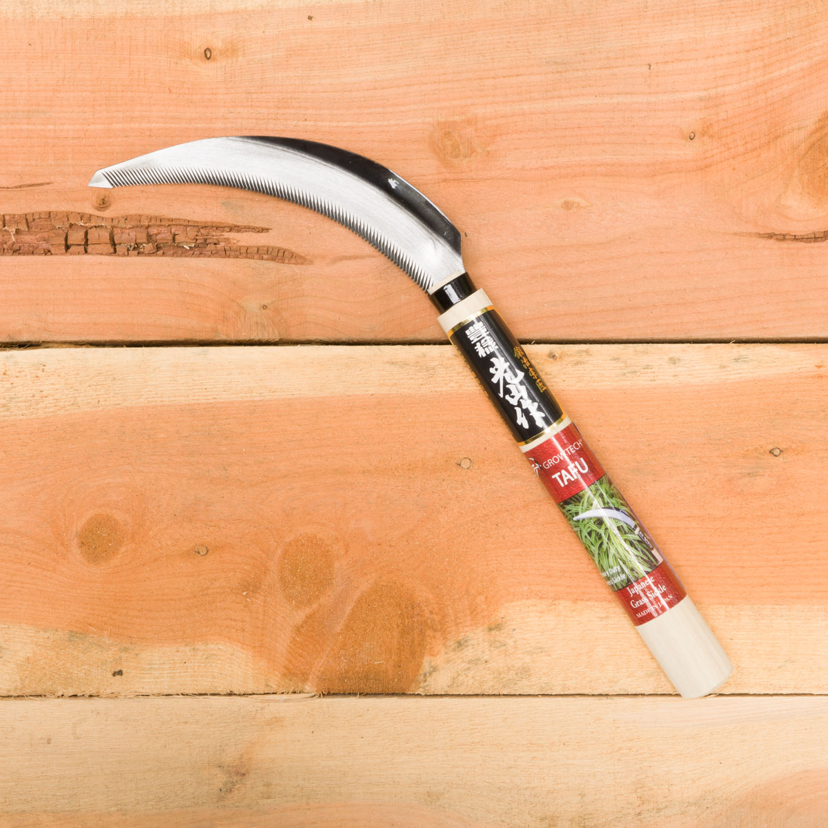 The tafu is a robust serrated sickle good for cutting tufted grasses.