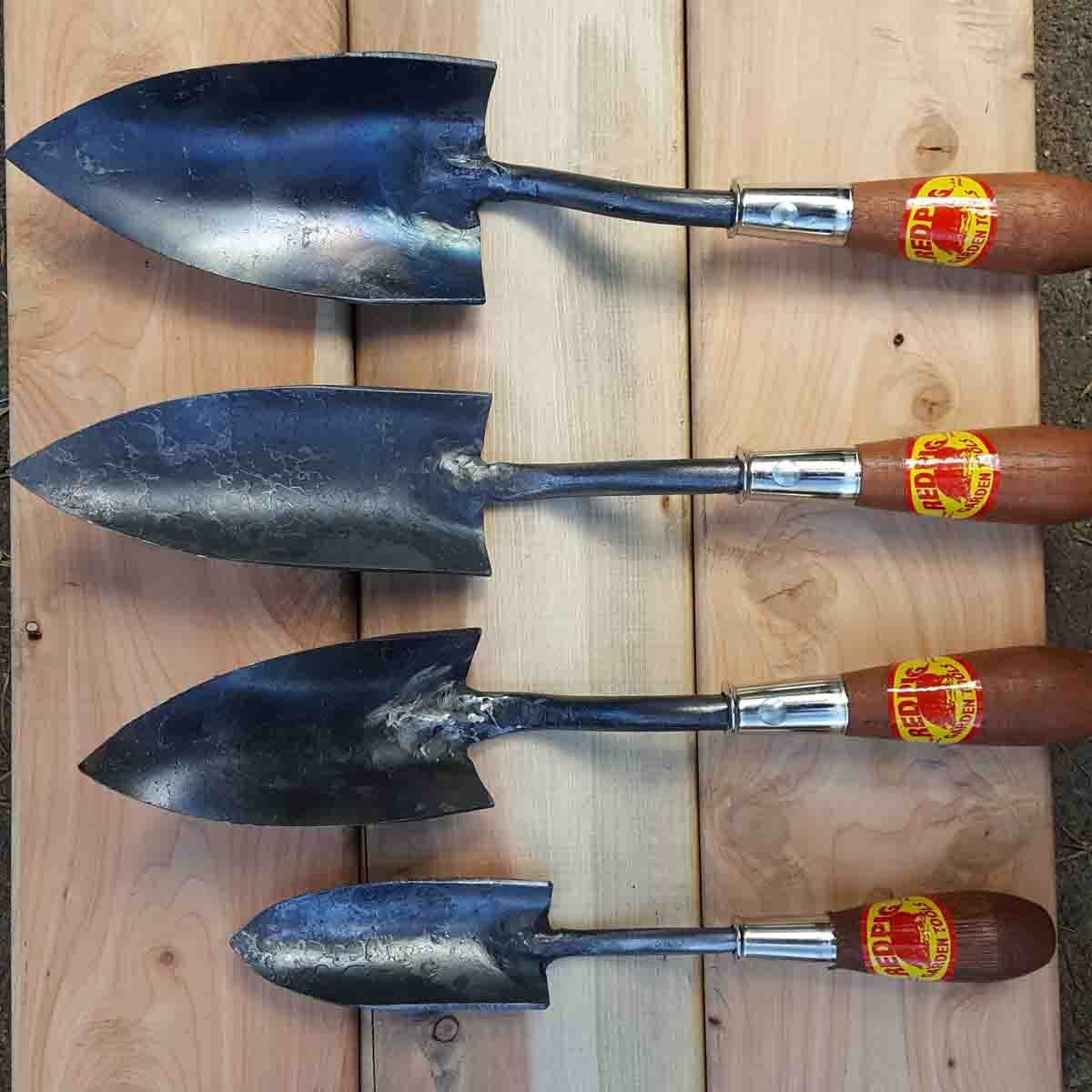 From top to bottom are large, medium, small and extra small trowels.