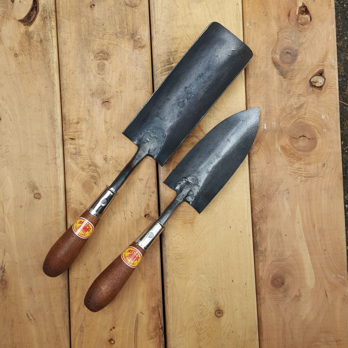 If you're transplanting larger plants, you can make a "bigger holeabout" the size of the trowel on the left.