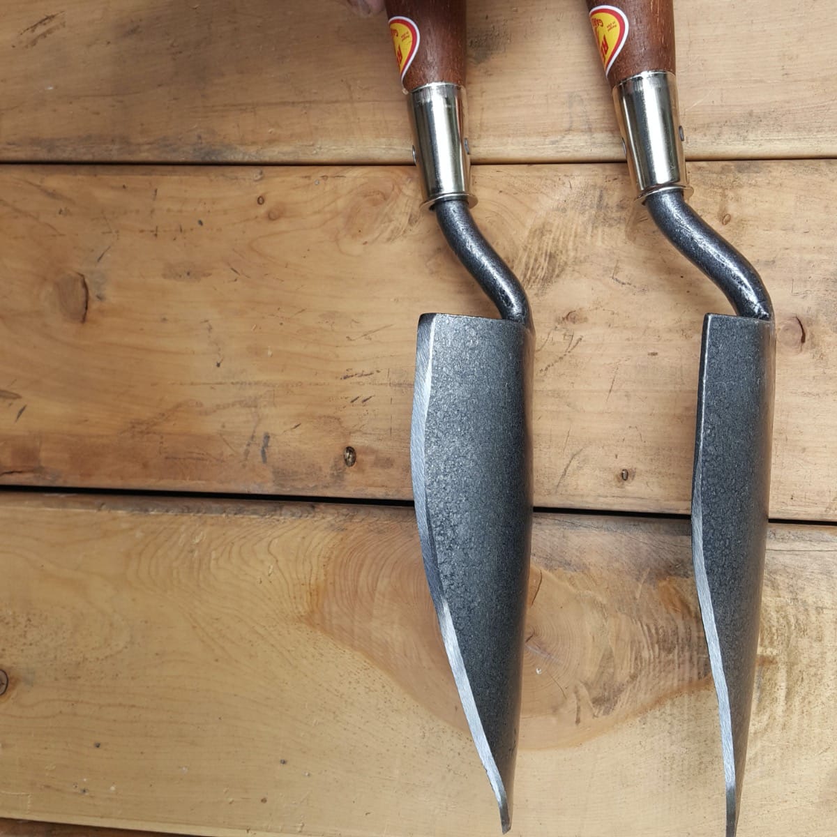 The medium trowel is about the same size as the hole about, but the side edge is not sharpened up to the top of the blade for making holes.