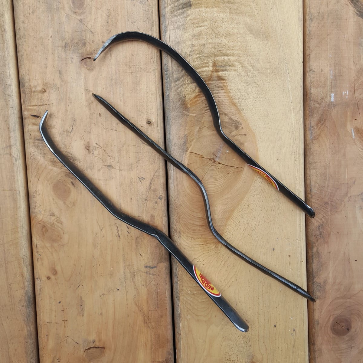 The traditional widger (option A) at center has two digging ends, while option B at left has a cultivating point and option C at right has an extended point for weeding.